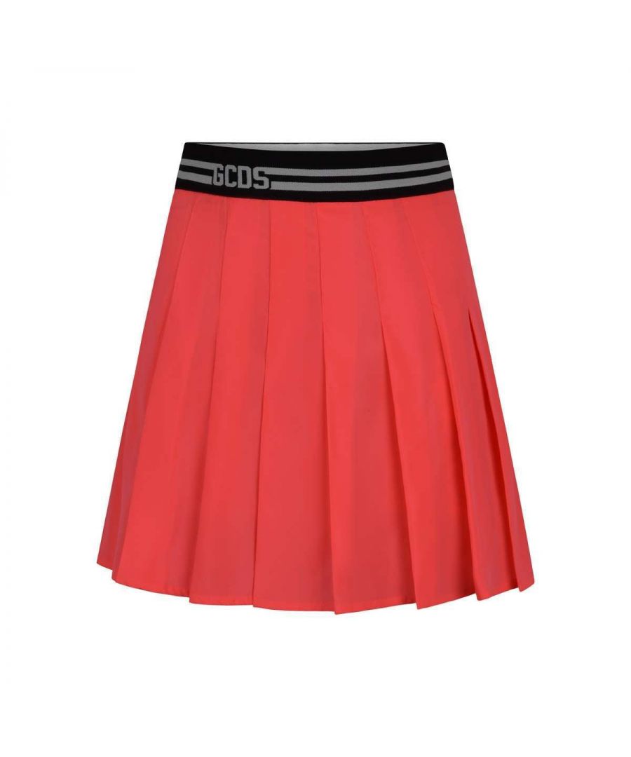 GCDS girls skirt in a neon pink with a branded elasticated waistband, a box pleated design and a cocnealed side zip fastening.