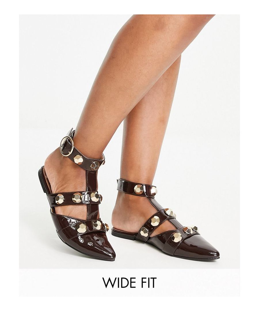 Shoes by ASOS DESIGN Love at first scroll Studded design Adjustable ankle strap Pin-buckle fastening Pointed toe Flat sole Wide fit  Sold By: Asos