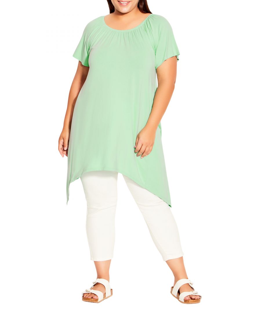 Love your curves in the Hanky Hem Plain Tunic. Made from soft stretch fabric, this tunic is designed to flatter your curves and can be worn off-shoulder for a stylish look. The elasticated neckline and handkerchief hemline add a touch of elegance to this relaxed silhouette, making it the perfect choice for any occasion. Key Features Include: - Round elasticated neckline - On/off shoulder flutter sleeve - Soft stretch fabrication - Relaxed silhouette - Handkerchief hemline