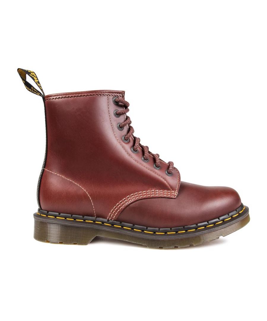Men's Rusted Brown Dr Martens 1460 Abruzzo Lace-up Ankle Boots With Smooth Heavy-duty Matte Leather Upper, Original 8-eyelet Silhouette, Iconic Yellow Stitching And Signature Heel Pull Tab. These Premium High-tops Are Finished With A Black Heel Panel And With The Air-cushioned Rubber Sole.