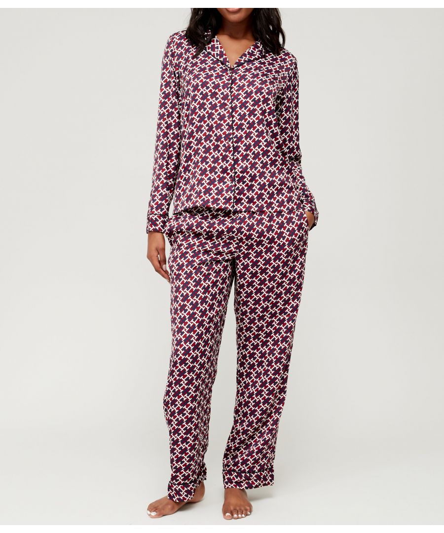 • RECYCLED POLYESTER (55%), POLYESTER PES (45%) • Adorned with a bold monogram print. Classic shirt silhouette. Button through fastenings. Elasticated waistband ensures a comfortable fit