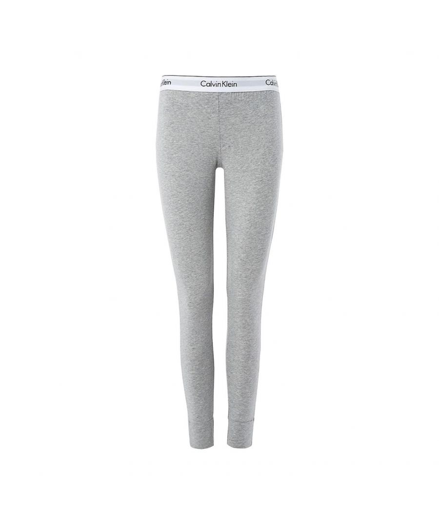 The Calvin Klein legging pant is designed for the ultimate comfort with a perfect minimalist design. They have an elastic waistband to create shape while allowing for a cosy fit. The perfect piece to wear when going about your day or to throw on for lounging. A staple piece for everyday life. Feeling comfy but looking stylish.\n\nFashionable design\nElastic waistband\nComfortable fit\nComposition: 55% Cotton | 37% Modal | 8% Elastane\n\nListed in UK sizes