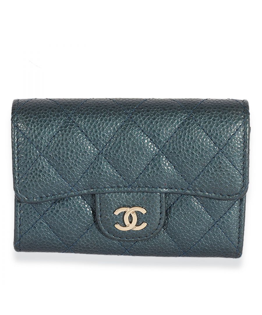 VINTAGE, RRP AS NEW\nBrand: Chanel. Depth 1.0. Exterior color (generic) blue. Exterior material (generic) leather. Exterior material (specific) caviar. Features interior one gusset. one slip pocket. gender: unisex. hardware color silver-tone. hardware material silver-tone metal. interior color (generic) blue. interior material leather. length 4.5. occasions everyday; fall/winter; spring/summer; work. original box: no. original papers: no sku: 122049year 2018
