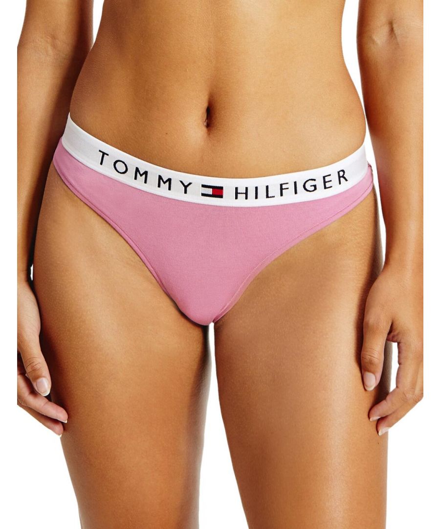 The Tommy Original Cotton collection blends the designers iconic athleisure style with breathable cotton that is ideal under activewear. This thong has a classic minimal shape with added Tommy Hilfiger logo waistband for a sporty designer look. Wear with coordinating lingerie from the Tommy Original Cotton series for a complete comfortable casual style.\n\nIconic athleisure style\nSignature Tommy Hilfiger logo waistband\nSexy minimal shape\nPremium soft cotton\nComposition: 90% Cotton | 10% Elastane\nListed in UK sizes