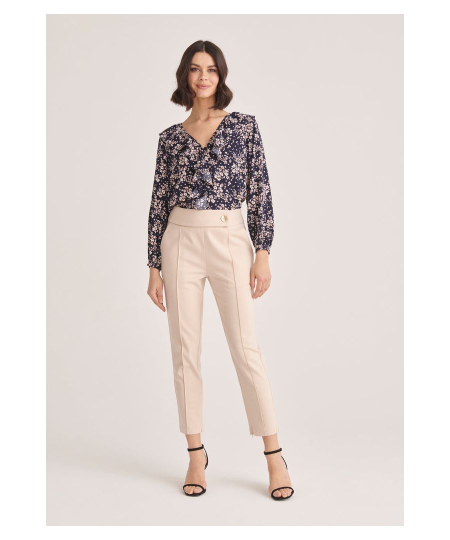 A floral blouse is a great day-to-night option for this winter. This design features a playful print and v-neck which is defined by gently moving ruffles. Wear it with skirts and trousers alike.\n\nLining, front button closure.\n\nAlso available in Pinks, Blues and Yellows.\n\nPerfect for: The office and cocktails.\n\nRegular fit. Our model wears a UK 8 and is 175cm/5'9