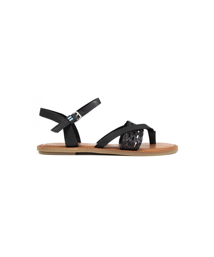 Womens black Toms lexie sandals, manufactured with leather and a rubber sole. Featuring: flat sole design, woven upper, buckle closure and leather footbed.