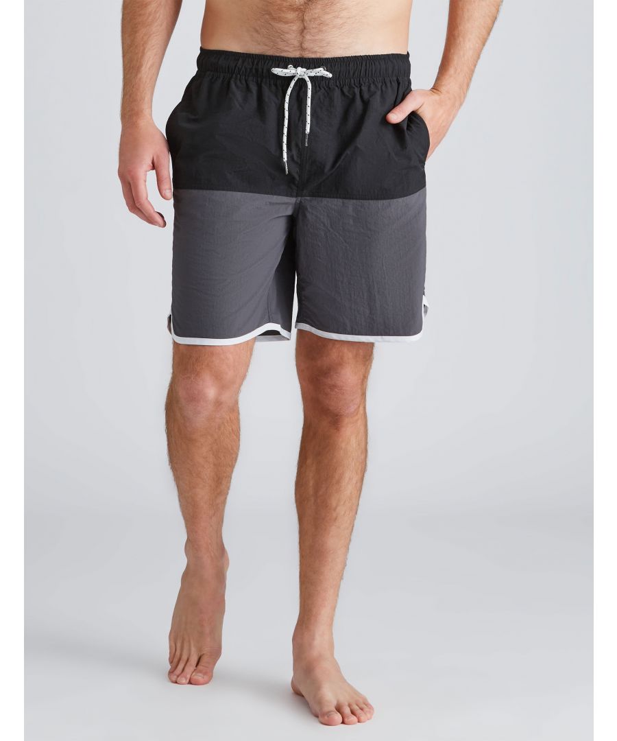 Whether it's for the beach or the pool, Rivers has got you covered with our panel swim short. Elasticated waistband 2 front pockets 1 Back PocketLightweight materialMaterial:  100% POLYESTER