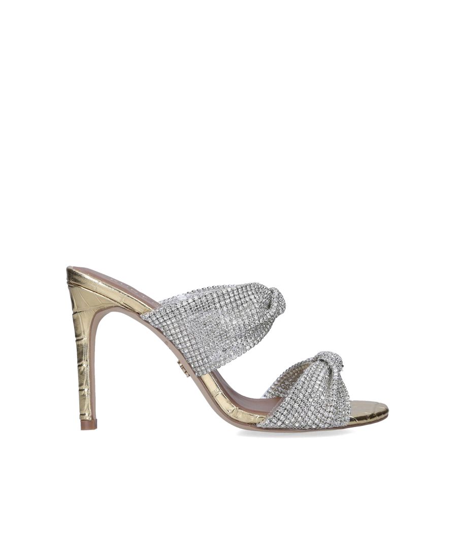 The Molten heel features a gold croc heel with twisted silver embellished straps.