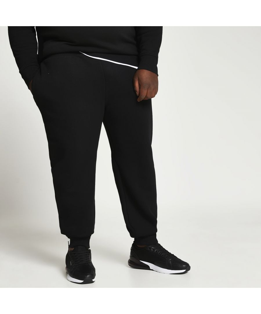 > Brand: River Island> Department: Men> Material: Cotton> Material Composition: 63% Cotton 37% Polyester> Type: Tracksuit> Style: Jogger> Size Type: Big & Tall> Fit: Slim> Closure: Drawstring> Leg Style: Straight> Pattern: No Pattern> Occasion: Casual> Selection: Menswear> Season: SS21