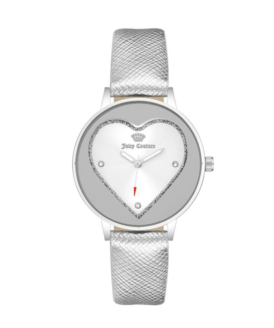 Juicy Couture Watch JC/1235SVSI\nGender: Women\nMain color: Silver\nClockwork: Quartz: Battery\nDisplay format: Analog\nWater resistance: 0 ATM\nClosure: Pin Buckle\nFunctions: No Extra Function\nCase color: Silver\nCase material: Metal\nCase width: 38\nCase length: 38\nFacing: Rhine Stone\nWristband color: Silver\nWristband material: Leatherette\nStrap connecting width: 16\nWrist circumference (max.): 20\nShipment includes: Watch box\nStyle: Fashion\nCase height: 9\nGlass: Mineral Glass\nDisplay color: Silver\nPower reserve: No automatic\nbezel: none\nWatches Extra: None