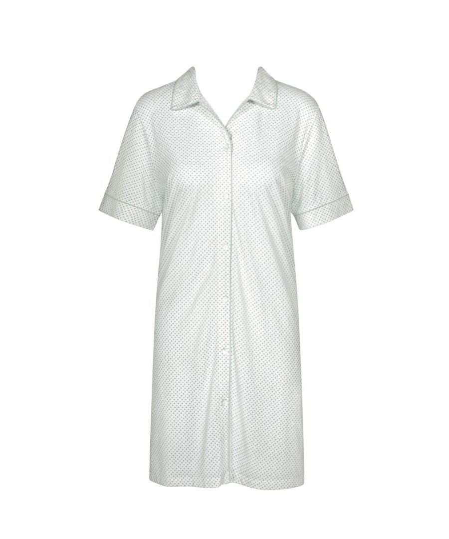 Triumph's new boyfriend nightshirt has a playful, feminine dots pattern with a boyfriend cut that makes it the ideal loungewear attire. The nightdress is comprised of a modal-cotton combination that is soft and warm against the skin. The dress has a round neckline and short sleeves and is knee-length.