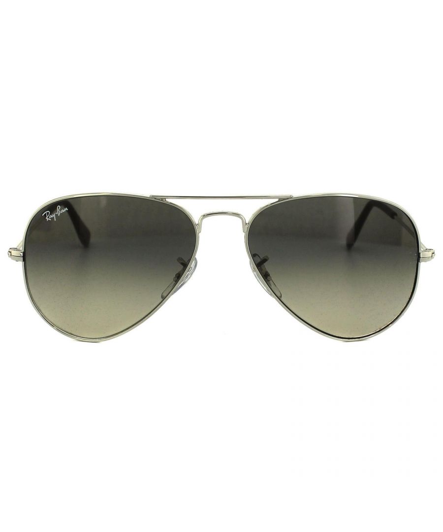 Ray-Ban Sunglasses Aviator 3025 003/32 Silver Grey Gradient 58mm were originally designed in 1936 for US military pilots and have since become one of the most iconic sunglasses models in the world. The timeless design is characterised by the thin metal wire frame, large teardrop shaped lenses and fine metal temples that feature silicone tips and nose pads for a customised and comfortable fit. This classic model is available in various sizes and an array of colourways.