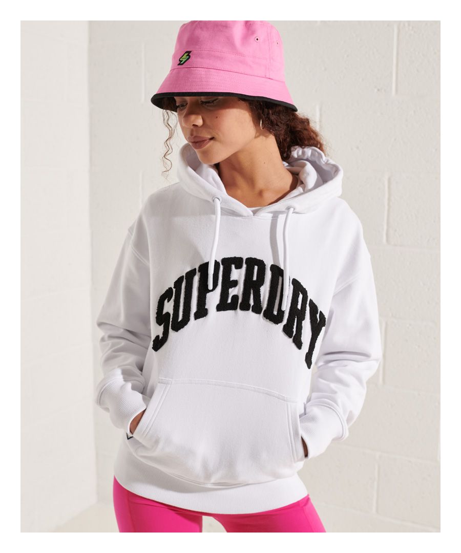 Whether you're looking for a chilled look, or a sporty vibe, we've got you covered with the Varsity Arch Mono Hoodie.Relaxed fit – the classic Superdry fit. Not too slim, not too loose, just right. Go for your normal sizeLong sleevesEmbroidered graphicFront pouch pocketDrawstring hoodRibbed cuffs and hemSignature logo patch