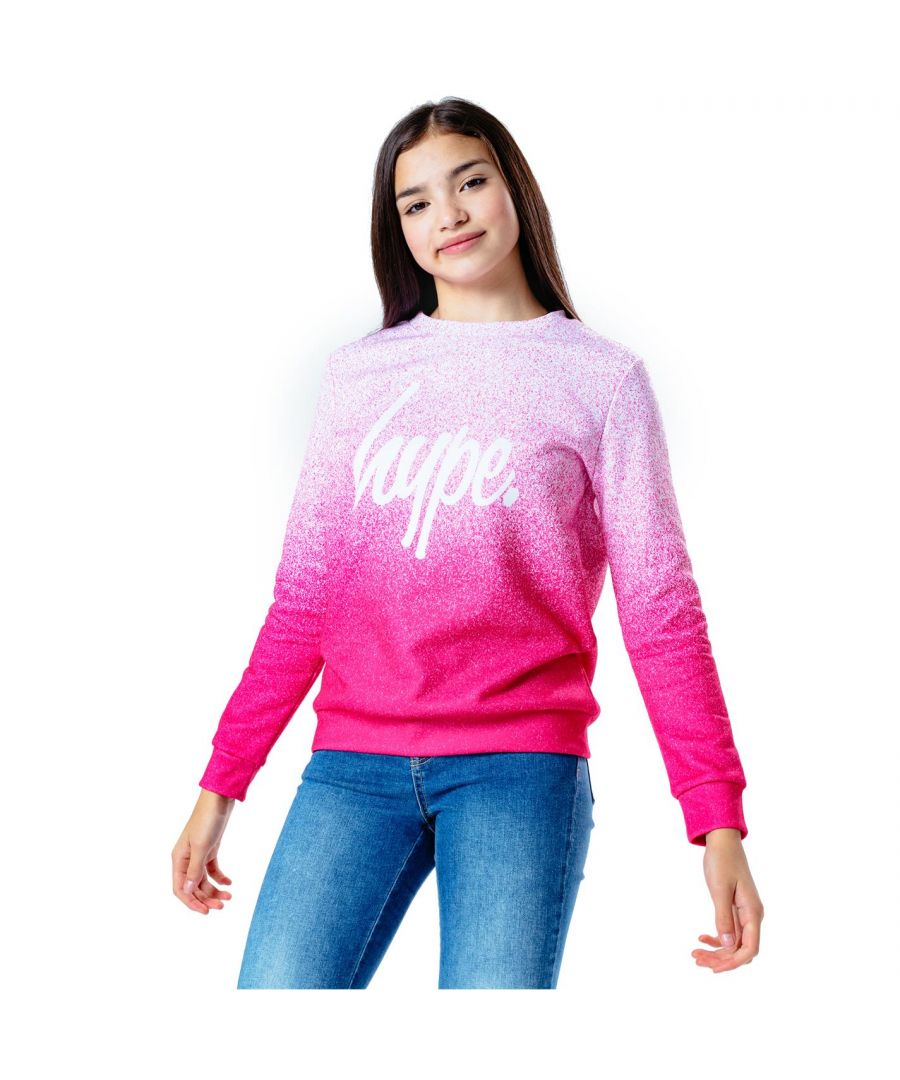 Update your 'drobe with the Hype. pink speckle kids crop crewneck. Designed in a white and pink colour palette in a 95% poly and 5% elastane fabric base for supreme comfort in our standard jumper shape, highlighting a crew neckline and fitted hem and cuffs. Finished with the iconic HYPE. script logo in a contrasting white across the front. Wear with cycle shorts for an on-trend look or with the pink speckle fade leggings for your next loungewear look. Machine wash at 30 degrees. > Regular Fit > Regular Length > Long Sleeve > Fastenings: Pull Over > Crew Neck Collar Style > Ribbed Cuffs > Standard Body Fit > Care Instructions: Machine Washable, Follow Care Instructions > Style: Sweatshirts