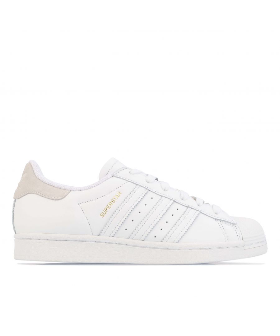 Womens adidas Originals Superstar Trainers in white.- Leather upper.- Lace up fastening.- Iconic rubber shell toe.- Signature details.- Classic serrated 3-Stripes.- Extra glam with lace jewels.- Rubber outsole.- Ref: GZ0866
