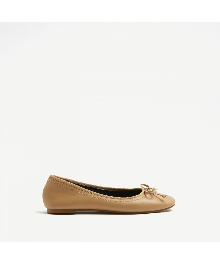 > Brand: River Island> Department: Women> Colour: Beige> Type: Flat> Style: Ballet> Material Composition: Upper: PU, Sole: Plastic> Material: PU> Upper Material: PU> Pattern: No Pattern> Occasion: Casual> Season: SS22> Toe Shape: Round Toe> Shoe Width: Standard