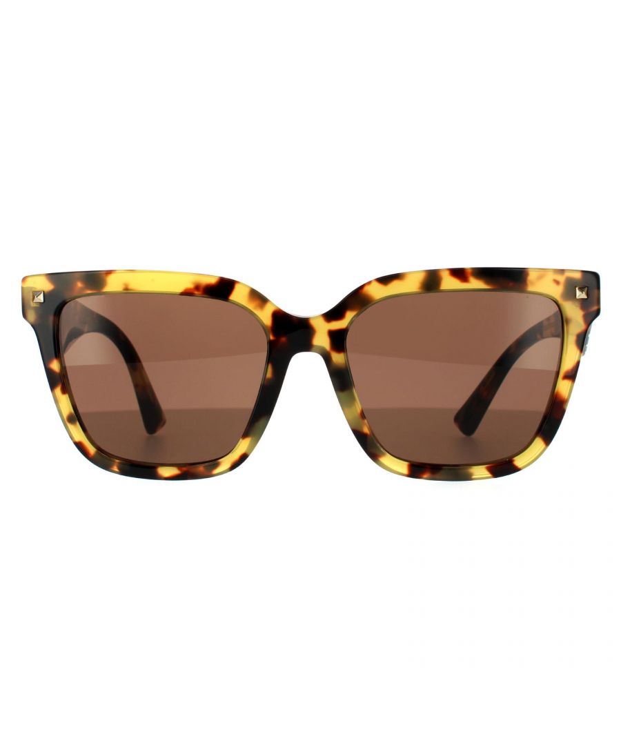 Valentino Square Womens Light Havana Brown Sunglasses VA4084 are a large oversized square design crafted from lightweight acetate. The Valentino logo features on the temples for brand recognition . Studs on the front frame complete the fashionable look