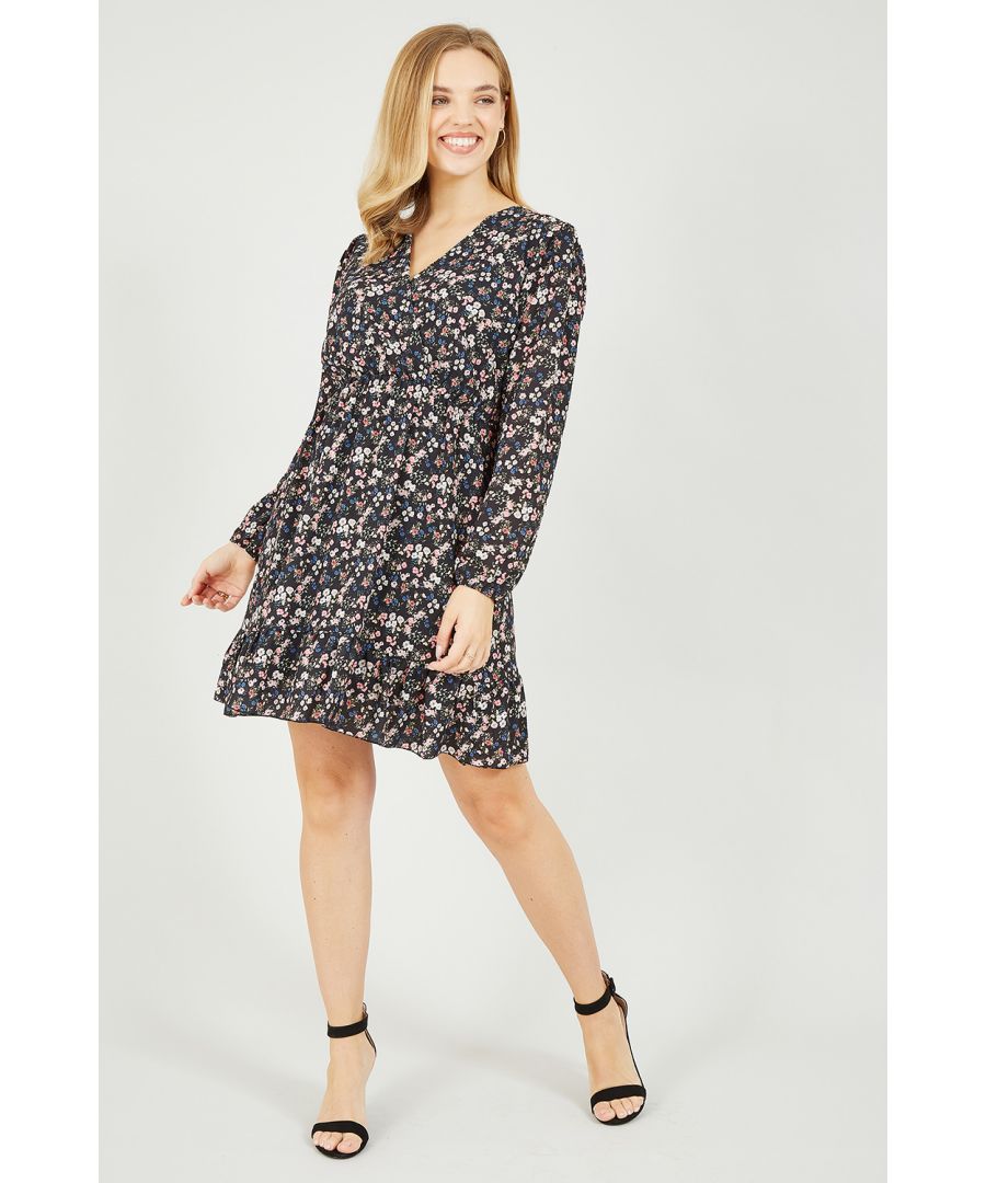 New season style, super cute floral ditsy print. Keep it classy in this stunning Mela Ditsy Flower Frill Wrap Dress. In a flattering wrap shape, this dress features a waist accentuating self-tie belt, a frilled gypsy hem and long sleeves. Match with block colour accessories and strappy heels or ankle boots to complete the look.
