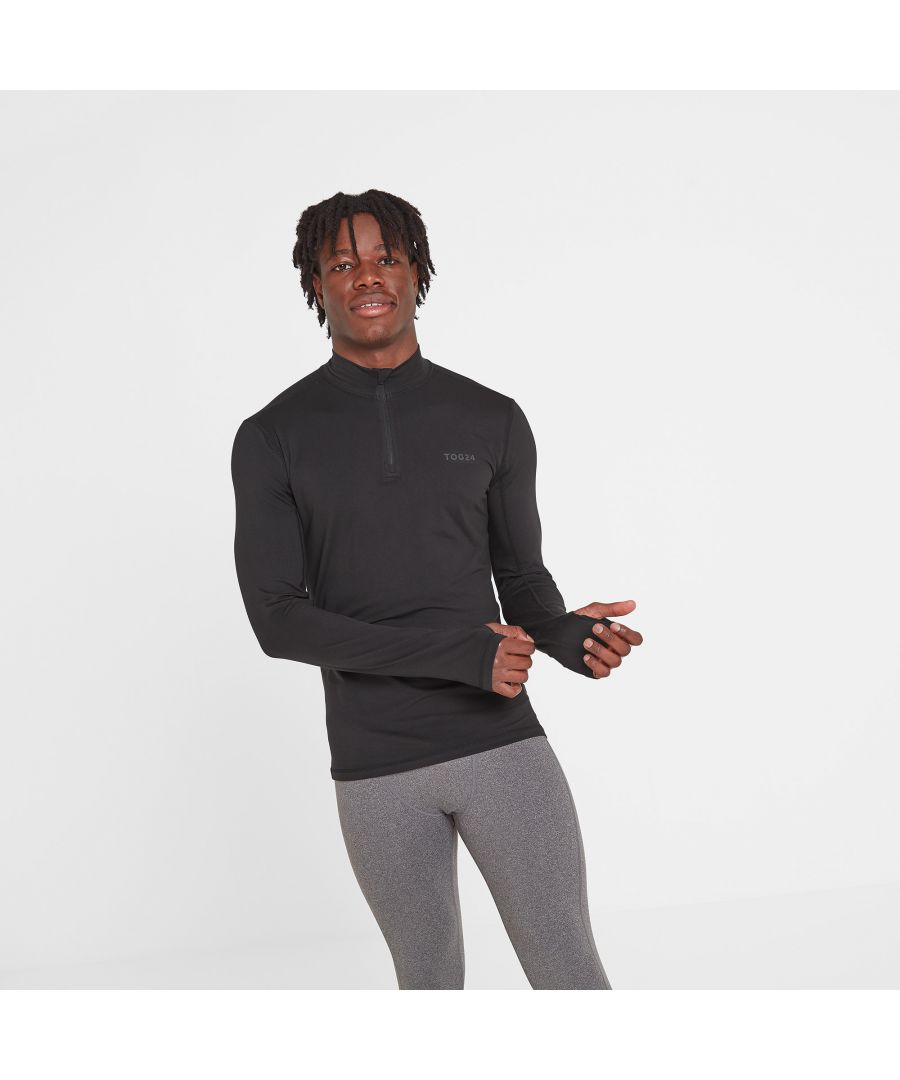 Get kitted out for winter adventure with a supersoft, thin and stretchy baselayer that you'll barely feel on your skin.  Lightweight and cosy, our thermal mens zip neck top wraps you up in gentle warmth without adding any bulk under your clothes. For comfort, it's breathable and wicks away moisture, and the seams are neat and flat inside to help prevent chafing. Designed with Alpine conditions in mind - as well as the icy blasts we get in North Yorkshire - it's ideal for any winter sports from skiing and snowboarding to hiking, cycling and motorcycling.  Wear it with the cuffs on your wrists or pull them down and use the thumbhole designed to stop any draughts on your arms. It also makes a great mens running top and you can even pop it on under a jumper to make a trip to the supermarket more bearable on a freezing cold day. Branded with our TOG24 logo on the chest, this top really is comfort in a box.
