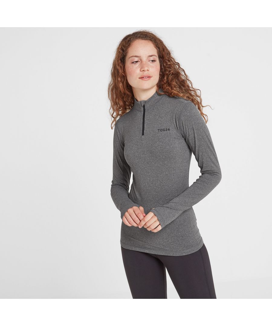 Get kitted out for winter adventure with a supersoft, thin and stretchy baselayer that you'll barely feel on your skin.  Lightweight and cosy, our thermal womens zip neck top wraps you up in gentle warmth without adding any bulk under your clothes. For comfort, it's breathable and wicks away moisture, and the seams are neat and flat inside to help prevent chafing. Designed with Alpine conditions in mind - as well as the icy blasts we get in North Yorkshire - it's ideal for any winter sports from skiing and snowboarding to hiking, cycling and motorcycling.  Wear it with the cuffs on your wrists or pull them down and use the thumbhole designed to stop any draughts on your arms. It also makes a great womens running top and you can even pop it on under a jumper to make a trip to the supermarket more bearable on a freezing cold day. Branded with our TOG24 logo on the chest, this top really is comfort in a box.