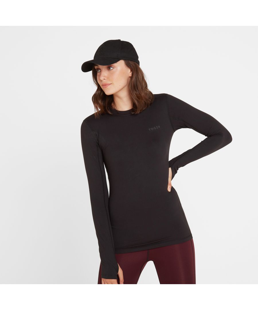 Get kitted out for winter adventure with a supersoft, thin and stretchy baselayer that you'll barely feel on your skin.  Lightweight and cosy, our thermal womens crew neck top wraps you up in gentle warmth without adding any bulk under your clothes. For comfort, it's breathable and wicks away moisture, and the seams are neat and flat inside to help prevent chafing. Designed with Alpine conditions in mind - as well as the icy blasts we get in North Yorkshire - it's ideal for any winter sports from skiing and snowboarding to hiking, cycling and motorcycling.  Wear it with the cuffs on your wrists or pull them down and use the thumbhole designed to stop any draughts on your arms. It also makes a great womens running top and you can even pop it on under a jumper to make a trip to the supermarket more bearable on a freezing cold day. Branded with our TOG24 logo on the chest, this top really is comfort in a box.