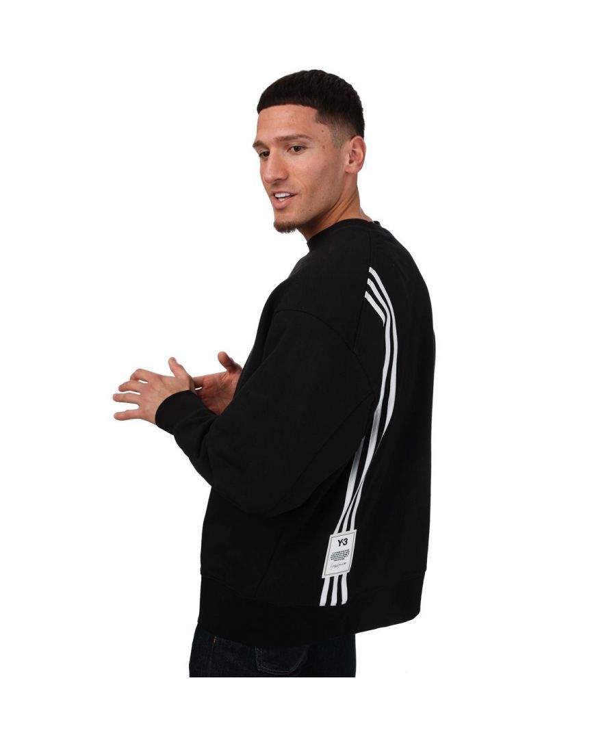 Mens Y-3 3- Stripes Crew Sweatshirt in black.- Ribbed crewneck.- Long slevees.- Ribbed cuffs and hem.- Y-3 tone-on-tone printed branding.- Three-stripe detail down the back.- Regular fit.- 100% Cotton.- Ref: H16333