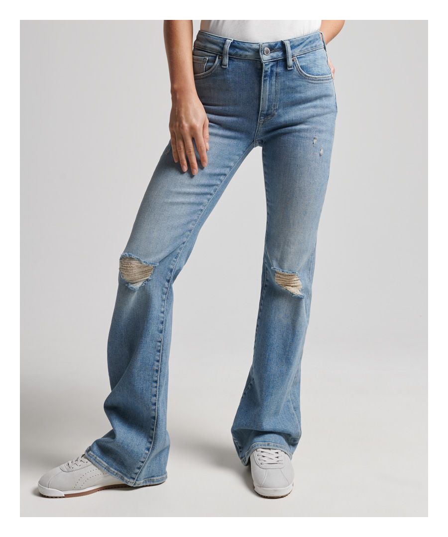 Get a vintage 70s look with the mid-rise slim Flare jeans. Will look great styled with boots or platform trainers.Button and zip fasteningClassic five-pocket designFlared cuffsSignature logo patchSlim Fit. With enough room to move, these slim fit jeans are cut for a sleek silhouette that sits close to the body and kick out from the knee, yet are still easy to wear.