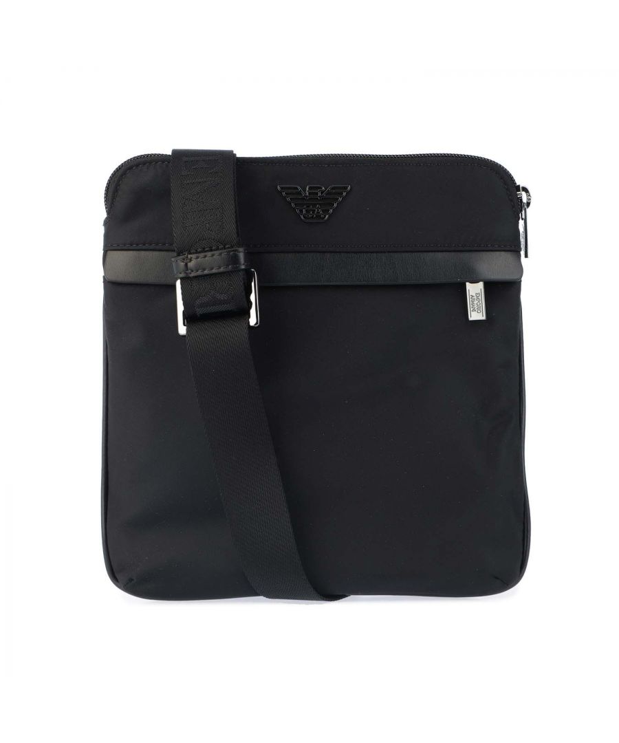 Mens Emporio Armani EA7 Crossbody Bag in black.- Adjustable shoulder strap.- Zipper closure.- Internal zip pocket.- External pocket with zip.- Techno fabric.- Moulded metallic eagle logo.- Fully lined.- Dimensions: 22 x 23 x 4 cm.- Ref: Y4M185139J0001