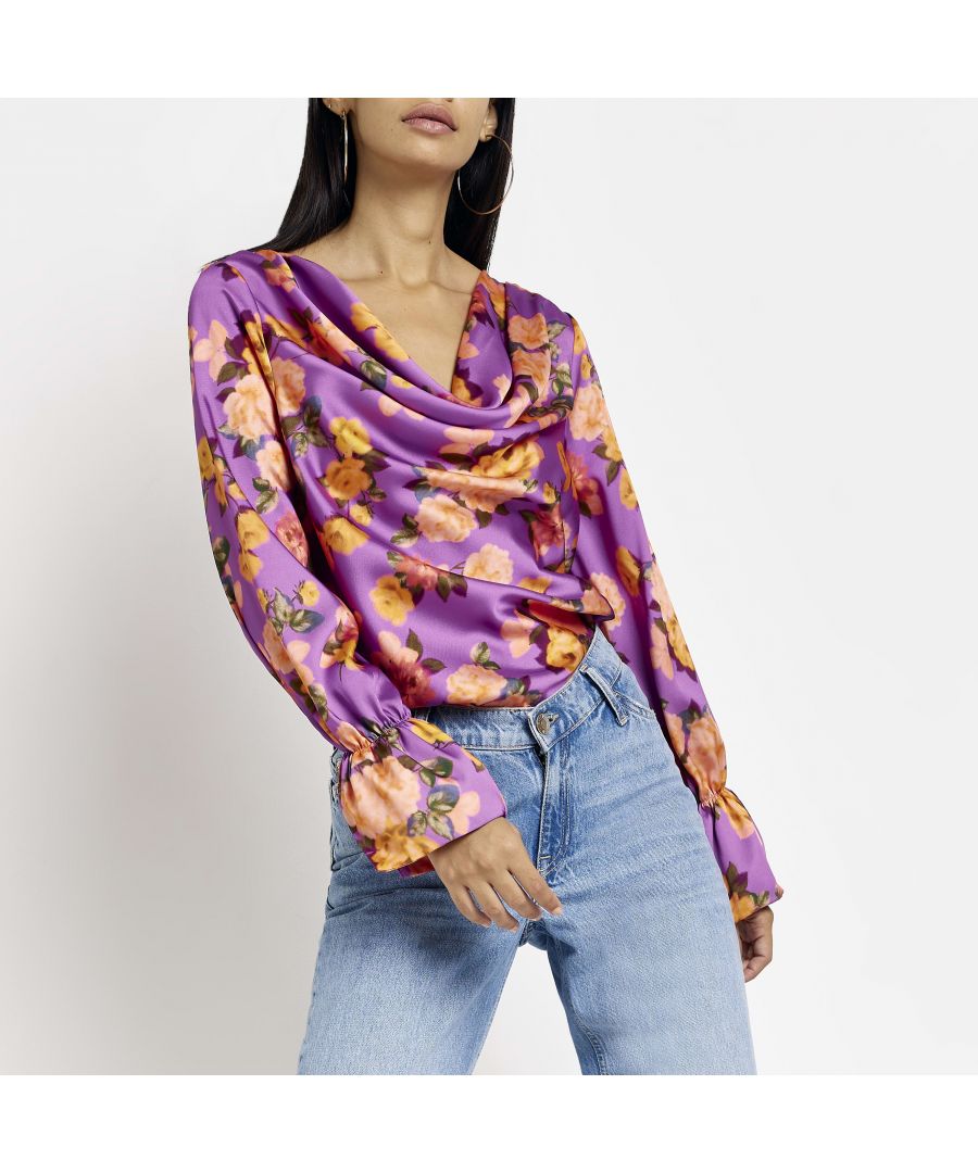 > Brand: River Island> Department: Women> Colour: Purple> Type: Blouse> Size Type: Regular> Material Composition: 100% Polyester> Occasion: Casual> Pattern: Floral> Material: Polyester> Neckline: Cowl Neck> Sleeve Length: Long Sleeve> Season: AW22