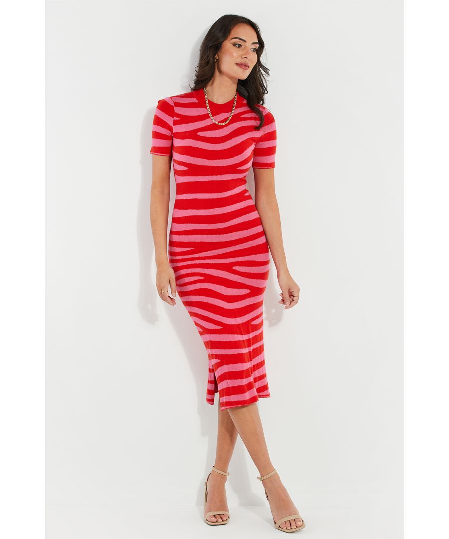 Make a statement with this printed knitted midi dress from Threadbare. The dress features a ribbed round neckline, short sleeves, and side splits. Wear this to the office with tights and boots or add a belt and heels for an evening out. Other colours are also available.