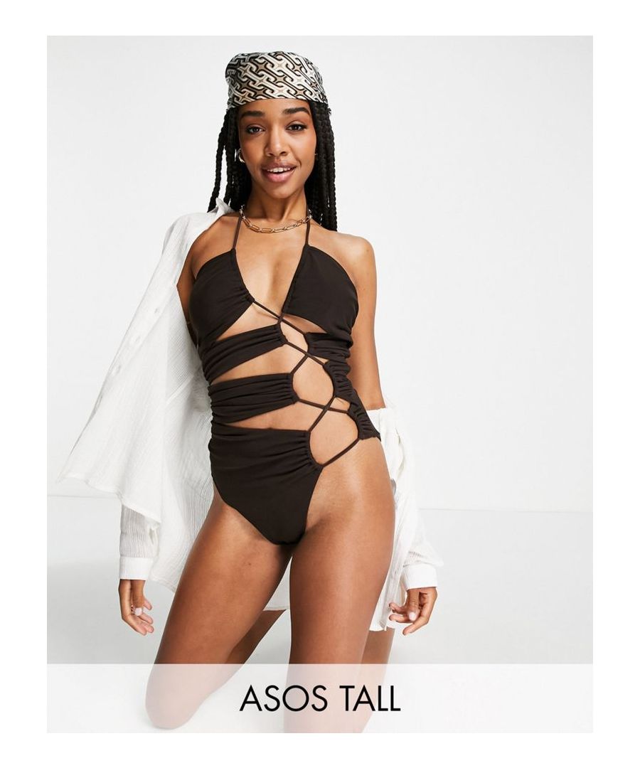 Tall swimsuit by ASOS DESIGN Meet you by the pool Lace-up design Halterneck style Wire-free Cut-out panels Tie fastening Brief cut Sold By: Asos
