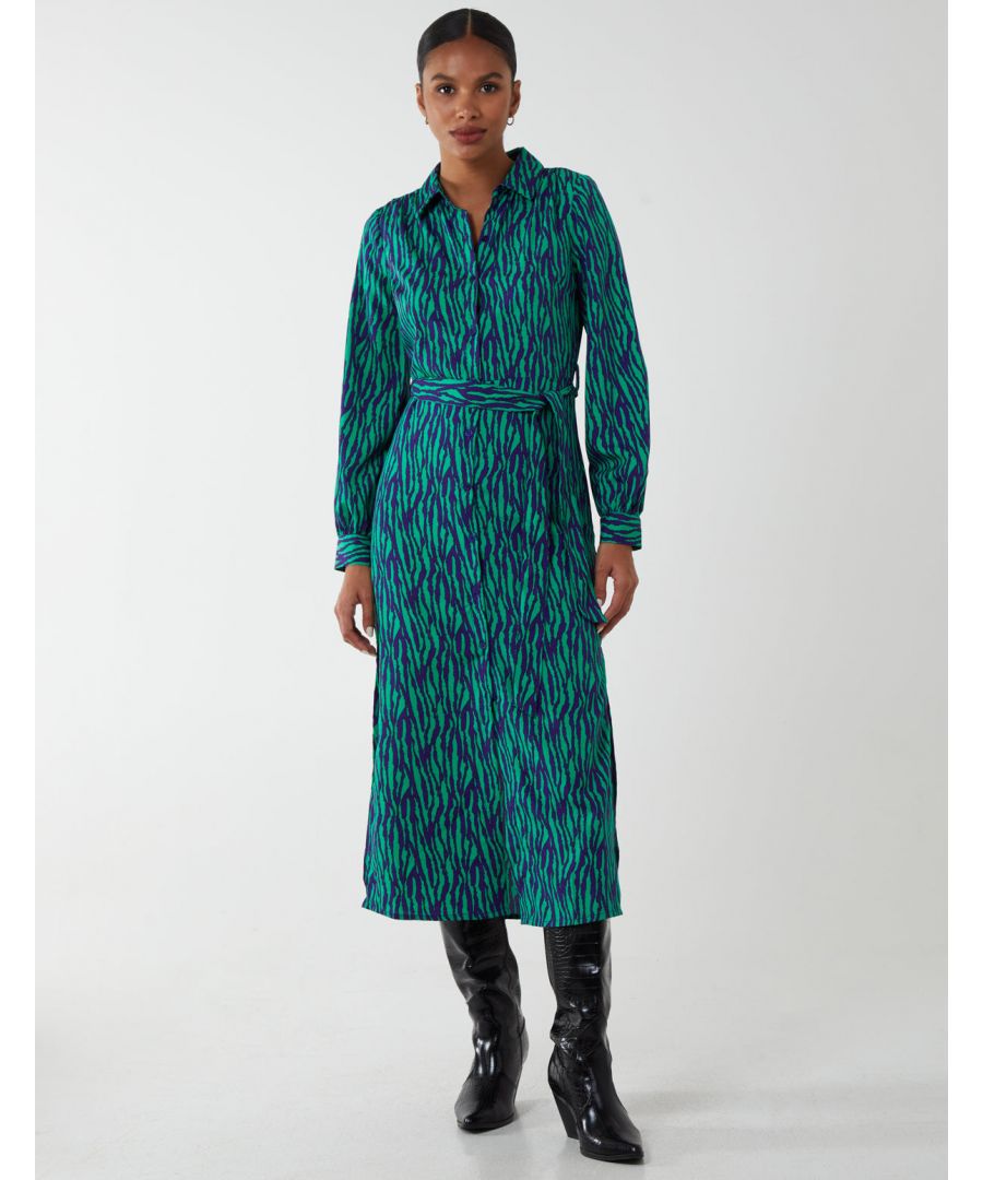 How wonderful it is to be able to wear dresses during colder months. This dress has a mid length, long sleeves, a button front, and collared neckline, that make this dress perfect for fall days. Enjoy this abstract print dress at a special event, and style with block heel boots.