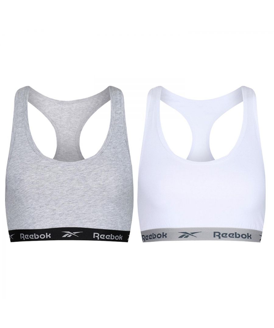 Warm weather calls for relaxed style. This racer back style women's Reebok Frankie crop tops are made from a comfortable cotton knit with a soft underband. Breathable and stretchy, this classic ladies’ sports cropped top design is ideal for working out, dancing, or for teaming with jeans on warmer days.\n\nBring sporty Reebok style to your layered looks. This women's crop top is made of stretchy cotton knit with a soft underband. Removable pads let you choose your level of coverage.\n\n* Soft and breathable\n* Elasticated fit\n* Stylish support\n* Removable pads\n* Tab collar style\n* Racerback\n* Ideal sports outfit\n\nSpecifics:\n* 95% cotton / 5% elastane knit\n* Available in sizes Extra Small, Small, Medium & Large.\n* Machine washable for easy care.\n* Elasticated underbust with Reebok branding\n\nPackage contains: Reebok Women's Crop Top, 2Pk