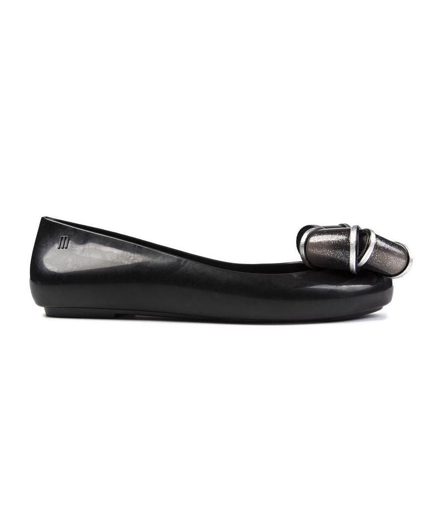 The Vivienne Westwood + Melissa Sweet Love Trans Bow Ballerinas In Shiny Black Are A True Representation Of The Iconic Westwood Aesthetic. Featuring The Designer's Beautiful, Sparkly Translucent Double Bow Detail, This Vegan Shoe Is Sure To Make A Bold Statement. You Can Wear This Pair With Anything From Jeans And A T-shirt To Your Favourite Cocktail Dress.