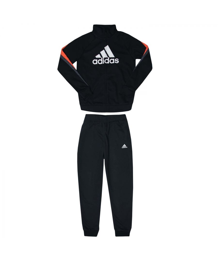 Junior Boys adidas Colourblock BOS Tracksuit in black.- Jacket:- Stand-up collar.- Full zip fastening.- Side slip-in pockets.- Ribbed cuffs.- Printed branding.- Regular-fit.- Main material: 70% Cotton  30% Polyester (Recycled). Rib Part: 60% Cotton  35% Polyester  5% Elastane. - Pants:- Drawcord on elastic waist.- Side pockets.- adidas logo at left thigh.- Ribbed cuffs.- Main material: 70% Cotton  30% Polyester (Recycled).- Ref: GM8925J