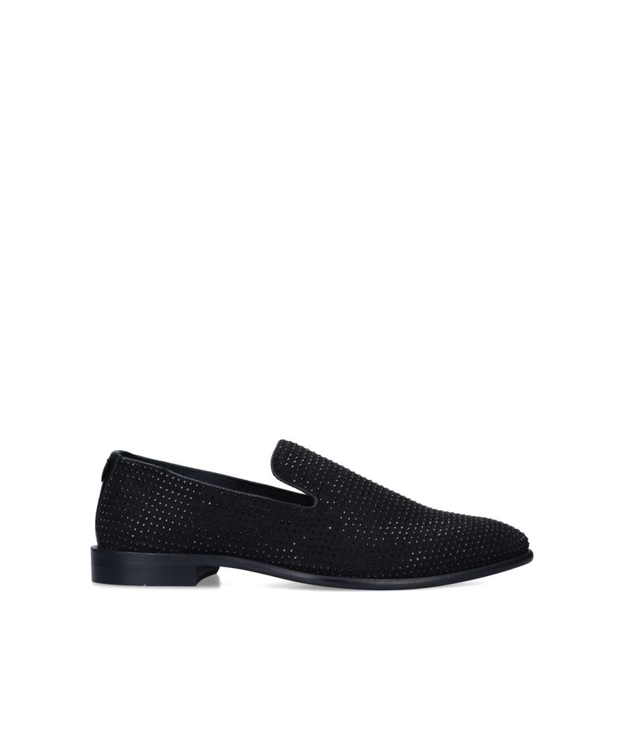 Crafted in a black suedette material, the Sting loafers are a formal style embellished with small black studs across the upper. The ankle features a very small red stitch sitting comfortably on a black block heel.