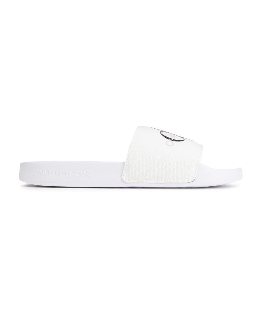 Womens white Calvin Klein Jeans slide sandals, manufactured with pu and a rubber sole. Featuring: comfy sole and large logo details.