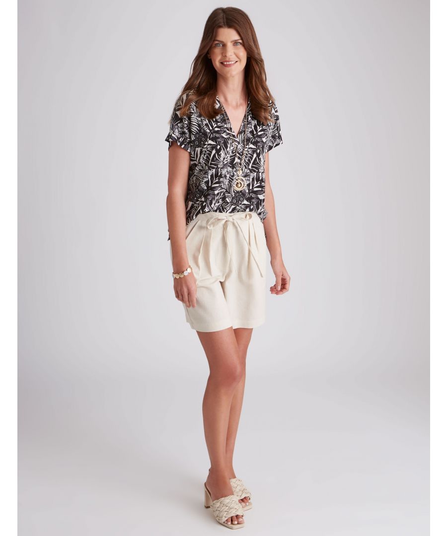 Slip into something a little lighter than usual with this relaxed blouse that features a v-neck neckline. Made from a lightweight grey fabric, it is perfect for the hot weather season. Not only is it comfortable, it also features a stand-away neckline that will let you show off your shoulders without feeling restricted. Pair with shorts, sandals, skirts, dresses, anything! This black blouse is perfect for a sleek and sophisticated day. With a fitted but relaxed fit, it's perfect for wearing when you want to feel comfortable yet polished. The long top length means that you can wear it in all sorts of ways, from casually over your jeans to more dressed up occasions. The soft print on the front is delicate but eye-catching, making this blouse versatile and stylish all at once. -- If you're looking for a summer blouse that's cut to flatter your figure, then we've got just the thing. This soft and flowing blouse has a v neckline and is made from a comfortable yet flowy fabric. It's perfect for wearing during warm weather or as an informal shirt to wear on special occasions. For the summertime season that never ends, reach for the skies with this black & grey masterpiece. Featuring short sleeves that elongate your arms while keeping you cool during hot weather, this printed beauty is perfect for any outing into nature's playground. A floral print brings life into what would otherwise be simple shades of black & grey, while complementing any interior style flawlessly. Lengthen your silhouette by choosing this stylish piece over your regular clothes today! -- In black, this sleek blouse is a must-have for any woman looking for a versatile piece that can be dressed up or down. It has a relaxed fit that makes it comfortable to wear all day long, and the long top length means you can flaunt your curves in all the right places. The print is beautiful flowers that will add a touch of elegance to any outfit you choose to wear it with.Material:  55% Linen / 45% Viscose