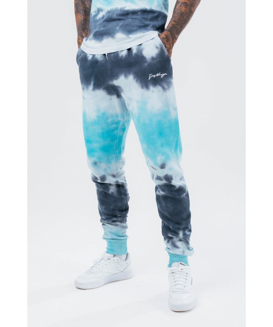 Stay on trend with the Hype Grey Acid Stripe Scribble Logo Men's Joggers and grab the matching hoodie to complete the set. Designed in a soft-touch 65% Cotton 35% Polyester fabric base with the supreme amount of comfort you need from your new joggers. The design boasts an acid wash or tie-dye wash finish with an elasticated waistband, drawstring pullers and fitted cuffs. Machine wash at 30 degrees.