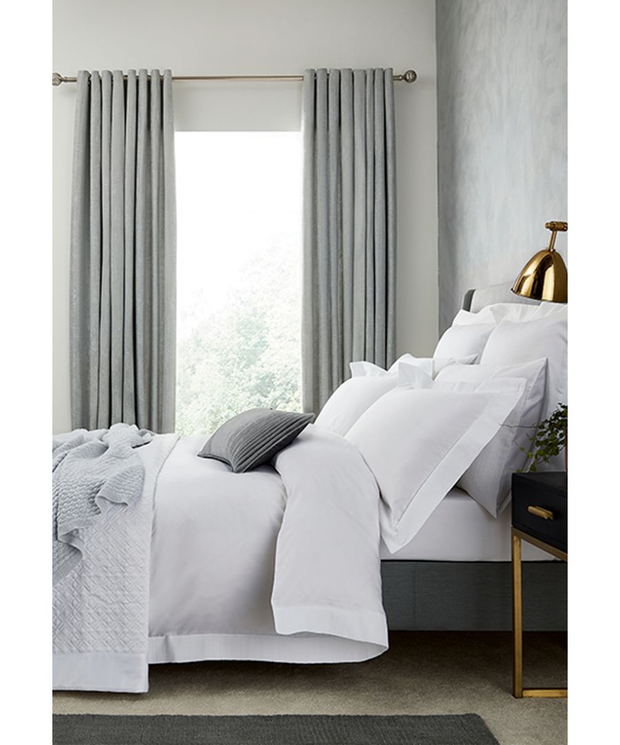 Classic white bedlinen is beautifully accented with a contrasting coloured platinum border, which features a delicate lace effect pattern. Isola’s subtle textural contrasts and tranquil tones create an enduring, yet modern style. Woven in a premium 600 thread count cotton sateen, the range is available in duvet covers, standard, Oxford and square Oxford pillowcases and can be layered with any of the accessories from the Peacock Blue Hotel range. Made in China.