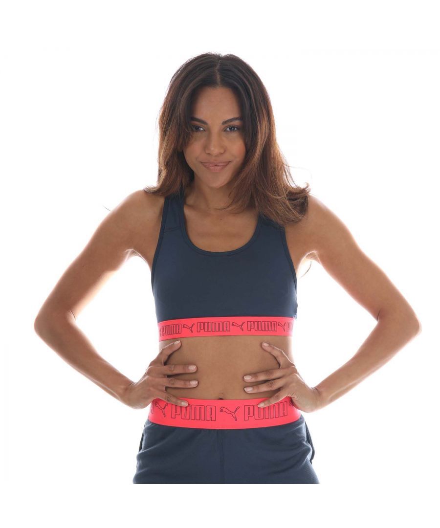 Womens Puma Mid Elastic Padded Training Bra in dark blue.- Elastic bottom band to enhance support.- Stabilised shoulder straps with racerback construction.- Mid impact support with removable pads.- Shell: 89% Polyester  11% Elastane.  Machine washable.- Ref:52030366