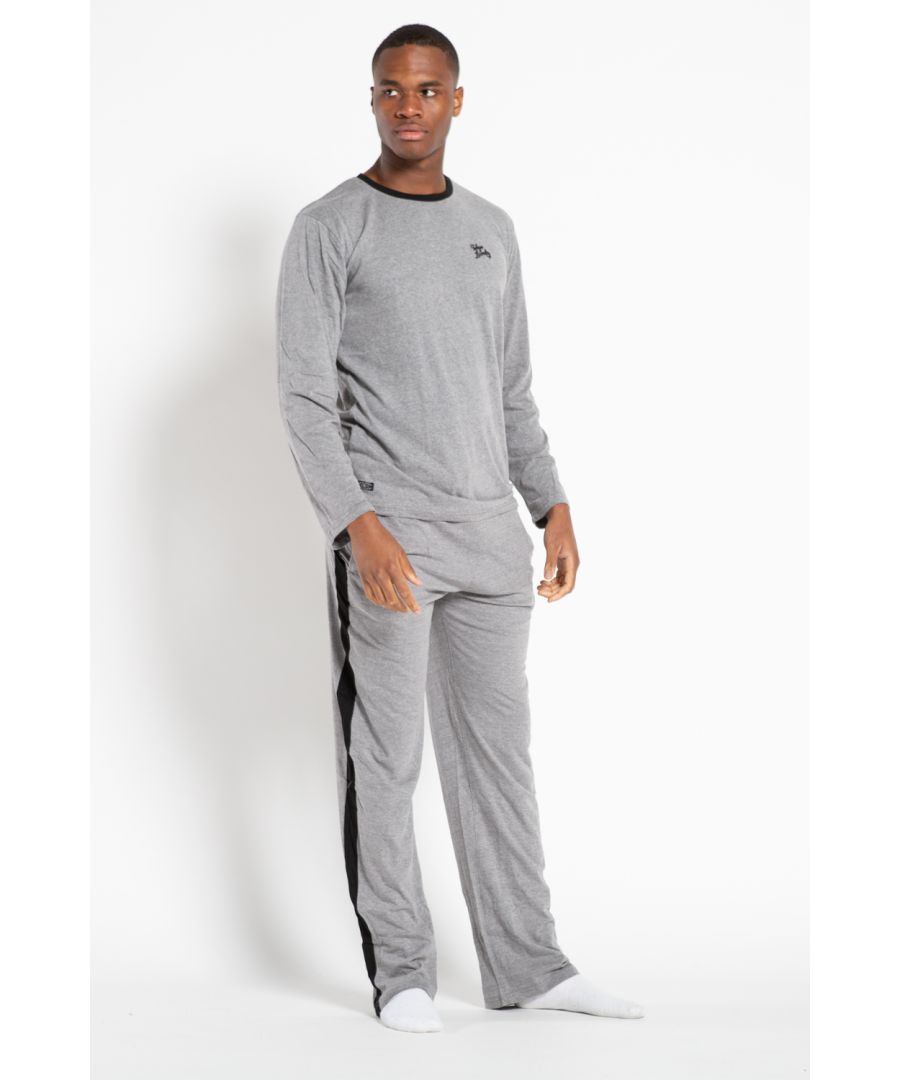 This loungewear set from Tokyo Laundry includes a long sleeve t-shirt and jersey trousers. T-shirt features a crew neck, a ringer design, Tokyo Laundry logo on chest and a woven logo. Trousers feature contrast piping down the legs, elasticated waistband, drawstring and two side pockets. Made from combined cotton fabric to ensure comfort and high quality.