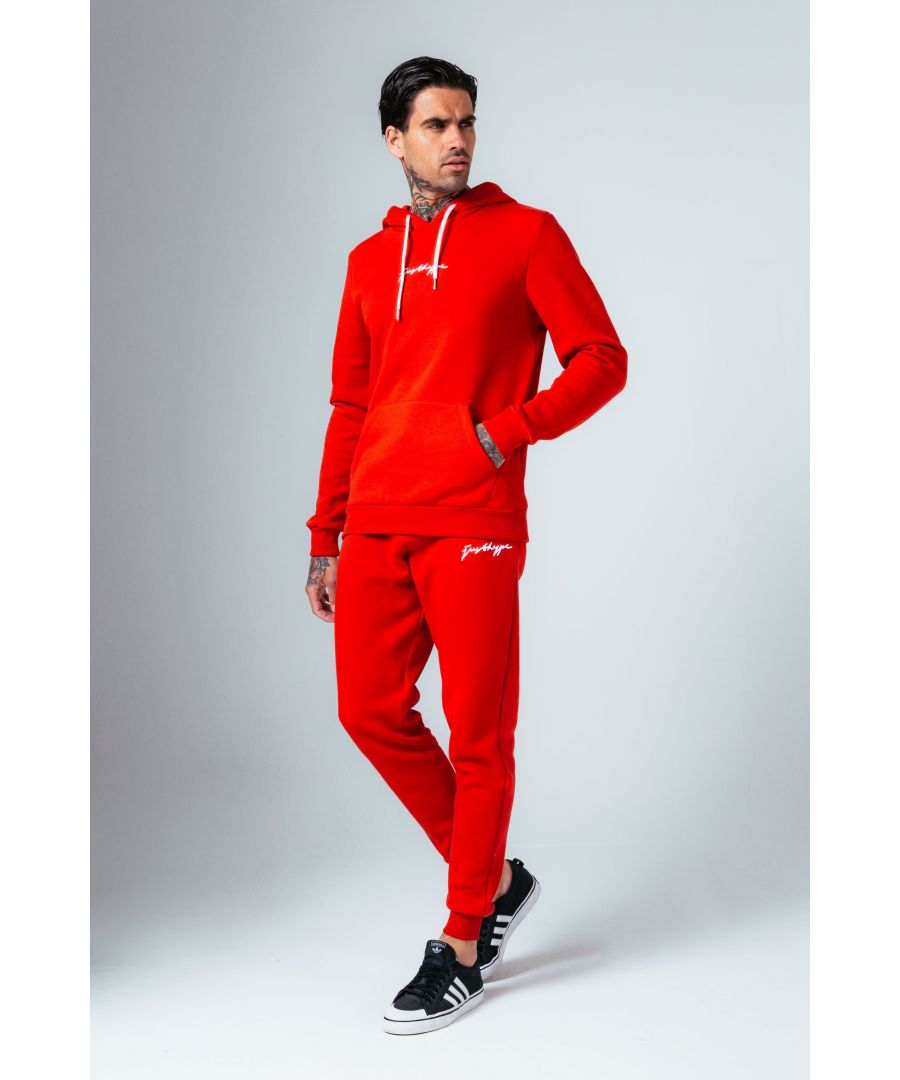 The Hype Red With White Signature Script Men'S Hoodie & Jogger Set is your new go-to loungewear set when you need that extra comfort boost. Designed in 80% Cotton 20% Polyester for the ultimate soft touch feeling! The Hoodie features a fixed hood, kangaroo pocket, fitted hem and cuffs, finished with contrasting white pullers and embossed justhype embroidery across the front. The Joggers highlight an elasticated waistband, fitted cuffs and double pockets with contrasting white pullers and embossed justhype embroidery on the side of the leg. Wear together or stand alone with a pair of box fresh kicks. Machine washable. 