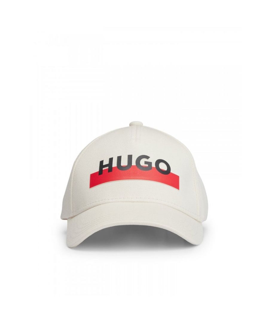 STYLE MEN-X 582-P - 50492678\nA five-panel cap in soft twill with a signature-red stripe and contrast logo by HUGO. By purchasing this product, you are contributing to protecting the environment and sustainable cotton farming in Africa.\nCmiA labelled products help to improve the living and working conditions of African cotton farmers and preserve nature.\n\nPrinted Logo\n100% Cotton\nHand Wash Only\nDo Not Bleach\nDo Not Tumble Dry\nDo Not Iron\nDo not chemical dry clean