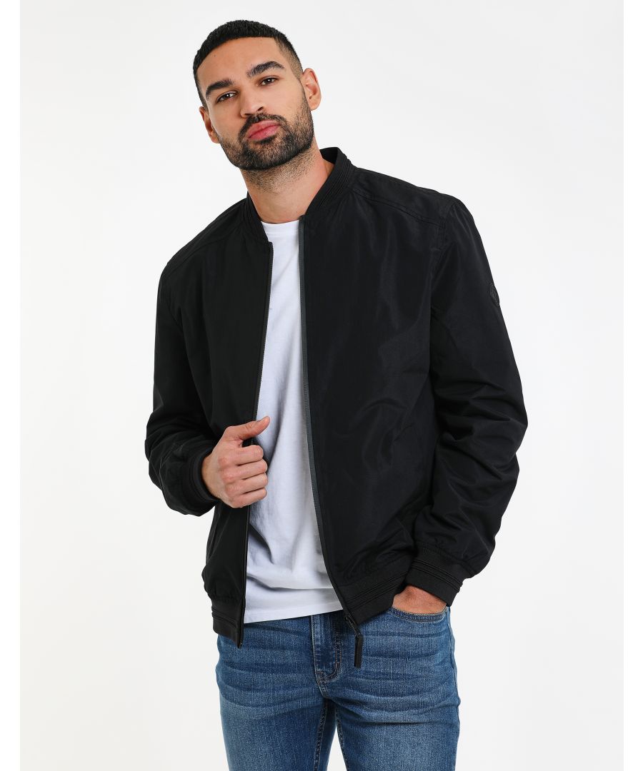 This classic, zip through bomber jacket from Threadbare features ribbed detail on the hem, neck and cuffs. It is finished with a brand logo on the arm and has two pockets. Team with a pair of jeans or trousers for a smart casual look.