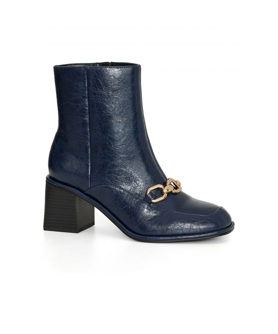 Add the finishing touch to any look with the Ethan Ankle Boot. Finished in an extra wide fit in a gorgeous blue colourway, be sure to step out in style with the chain detail and chic stacked block heel. Key Features Include: - Square toe - Extra wide fit - Side zip closure - Chain detail - Textured faux leather fabrication - Stacked heel