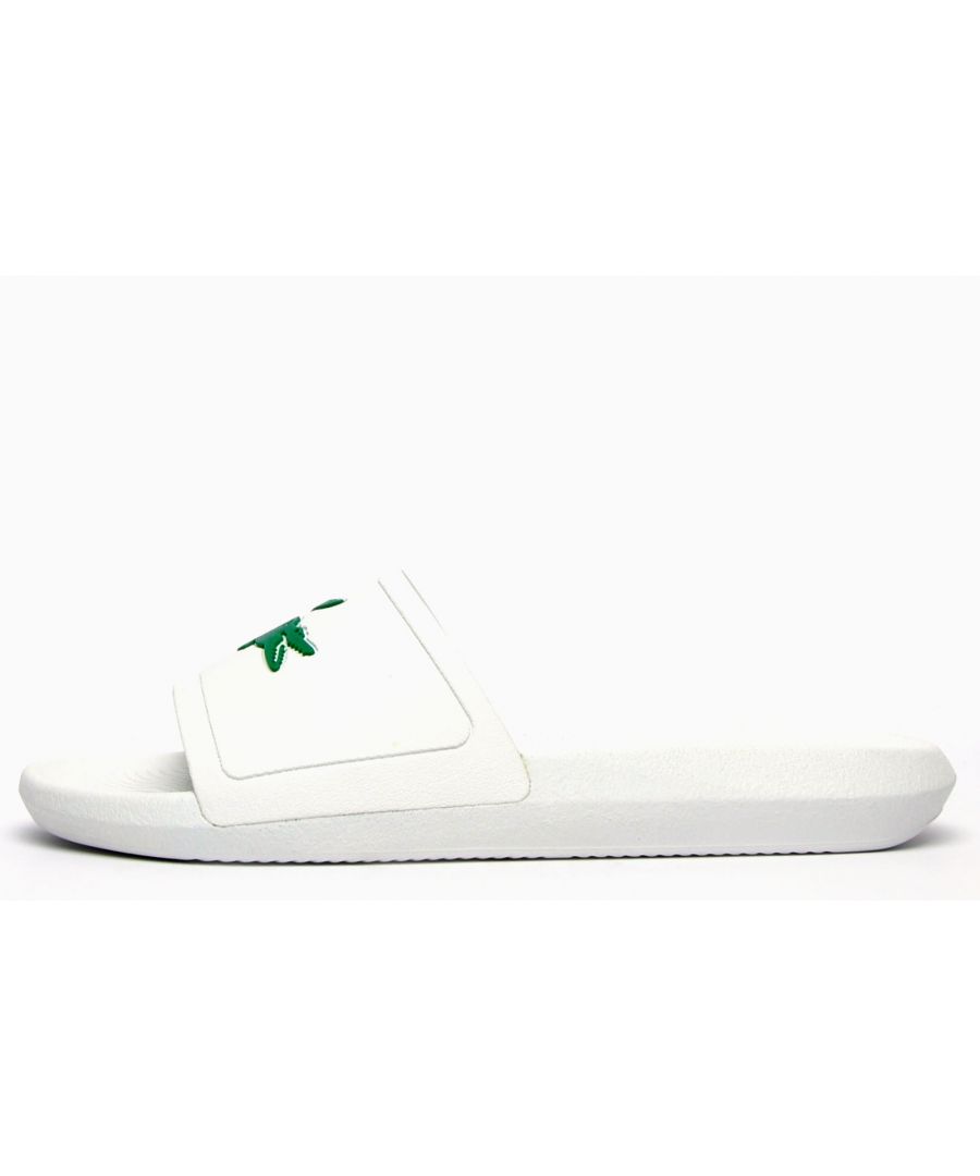 Head to the beach in style with these mens Lacoste Croco Slides. These on-trend sandals are crafted with comfort in mind whilst boasting a great water resistant super comfy footbed for a great fit and feel for the pool side and everyday wear. These designer slides are finished with eye catching Lacoste branding throughout just in case you want a sign of approval that youre wearing cool on trend style this summer season\n \n - Stylish synthetic upper\n - Comfort moulded footbed\n - Grippy outsole\n - Slip on wear\n - Iconic Lacoste branding throughout\n Please Note: These slides are supplied poly bagged (without box)\n These Lacoste Slides are sold as B grades which means there may be some very slight cosmetic issues on the shoe and they come in a poly bag. There could be occasional issues with wrong swing tags being allocated to wrong shoes by Lacoste themselves which could result in some size confusion but you must take the size IN THE SHOE as the size that the shoe actually is ( not what is on the tag ). We have checked most of the shoes and in our opinion,all are practically perfect without any blemishes on them at all and in essence if the shoes did not have the letter B denoted on the swing tag you would presume these were perfect shoes. All shoes are guaranteed against fair wear and tear and offer a substantial saving against the normal high street price. The overall function or performance of the shoe will not be affected by any minor cosmetic issues. B Grades are original authentic products released by the brand manufacturer with their approval at greatly reduced prices. If you are unhappy with your purchase, we will be more than happy to take the shoes back from you and issue a full refund
