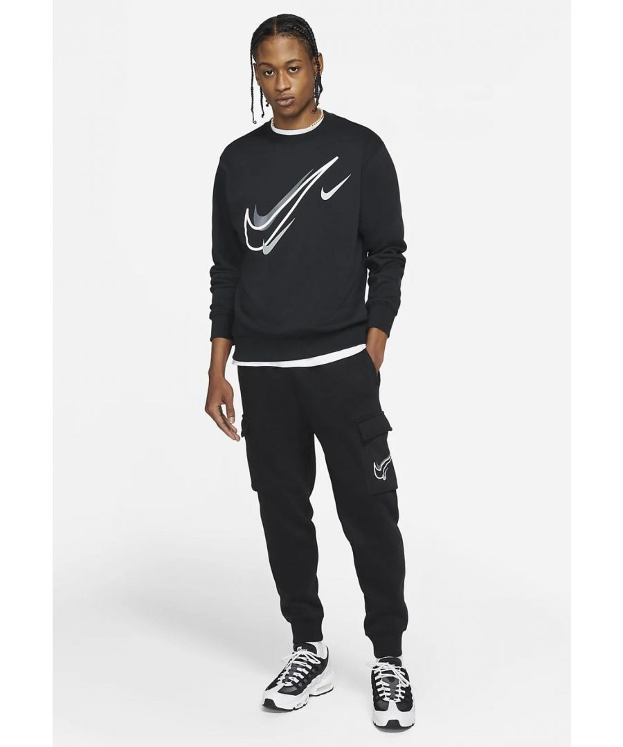 Nike Sportswear Fleece Full Tracksuit.       \nCrew Neck Top, Sportswear Multi Swoosh Graphic.      \nRibbed Neckline, hem and Cuffs.      \nElasticated Waist Concealed draw cord Cuffed Joggers.      \n2 Side Pockets, 2 Cargo Flat Pockets Secured with Pressed Buttons.      \nSoft and Comfortable Feel Fabric.