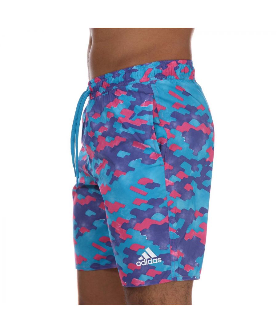 Mens adidas Real Madrid Swim Shorts in pink purple.- Elasticated drawstring waist.- Mesh side pockets.- Mesh inner briefs.- Soft  lightweight feel.- Main material: 100% Polyester (Recycled). Machine washable.- Ref: GV1540