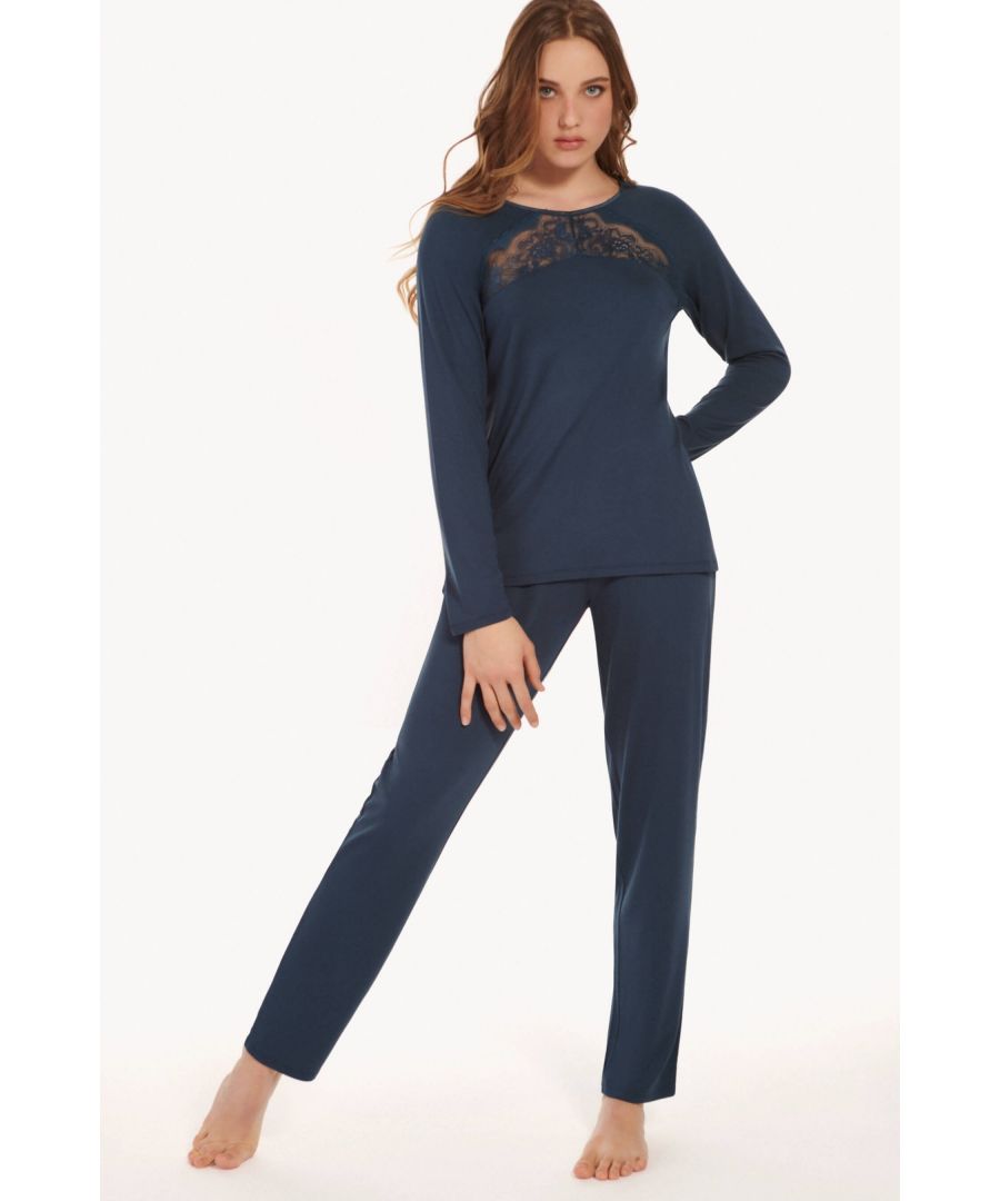 These feminine pyjamas from the Lisca 'Evelyn' range are made from comfortable modal material that flows softly against the body. The pyjamas are of a classic cut, with long bottoms and long sleeves. The set ensures comfort both during sleep and while lounging. Decorative lace in the front adds a touch of elegance.  